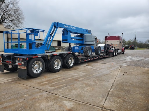 genie boom lift on trailer