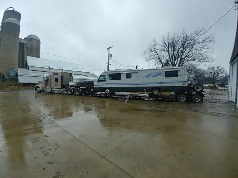 RV on trailer for transport
