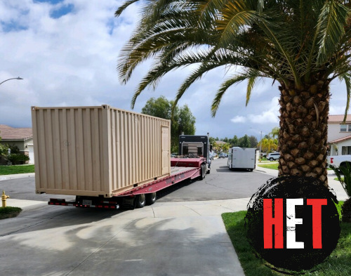 Container transported by semi truck.