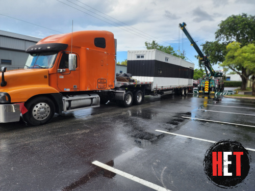 Container transported by semi truck.