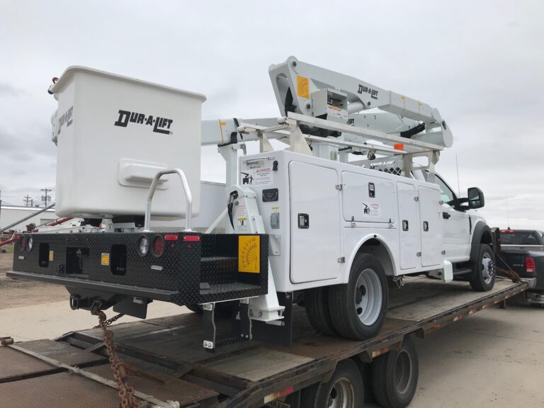 Ford crane truck on hot shot trailer