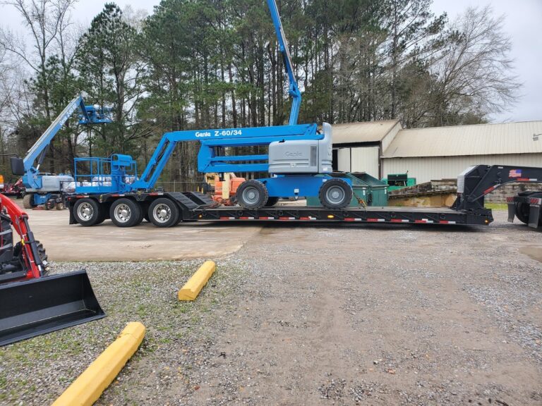 Telescopic boom lift on RGN trailer