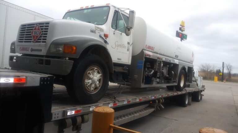 Aircraft fuel truck and fuel tank on a step deck