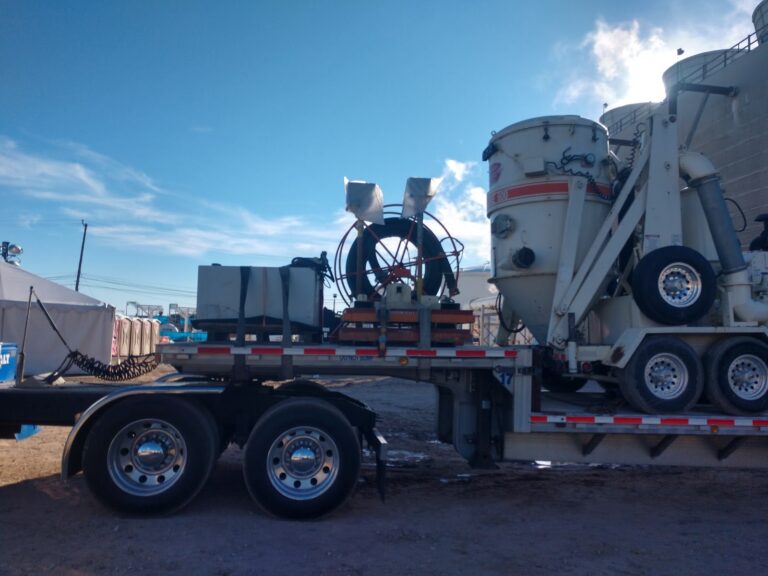 Building equipment on step deck trailer