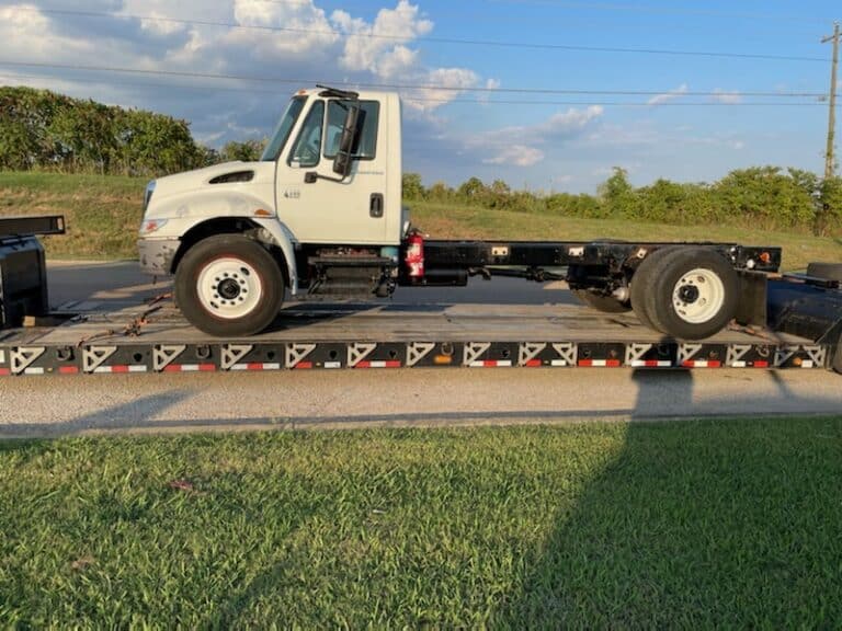 truck on a lowboy trailer