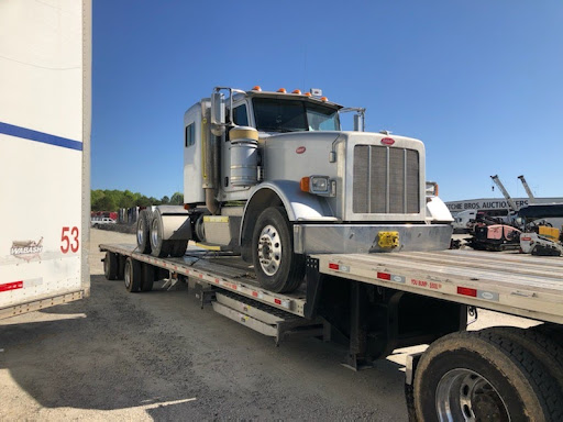 peterbilt semi on step deck trailer