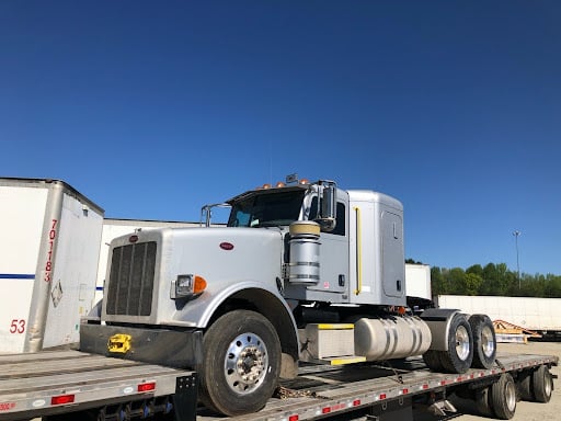 peterbilt semi on step deck trailer