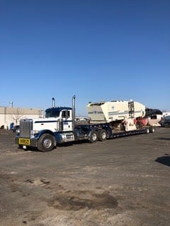 Cold planer on trailer for transport