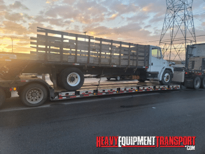 Transporting a 2003 Freightliner FL6 Truck on a lowboy trailer