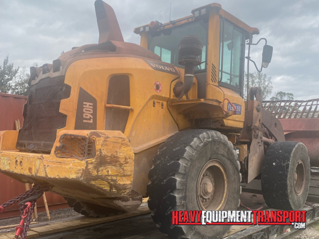 Volvo loader on trailer for transport