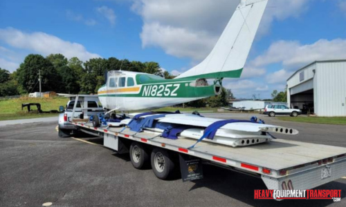 Transporting a small airplane and wings.