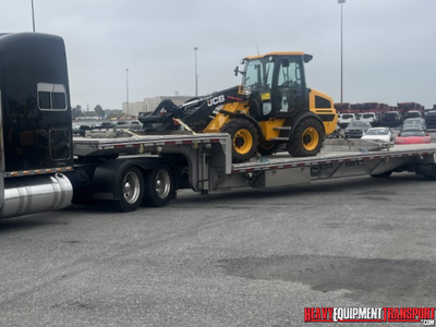 JCB 409 wheel loader haul.