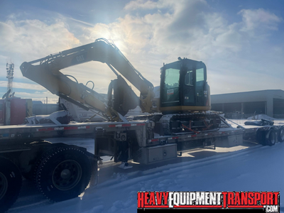 Transporting a 2018 Cat 308 excavator.