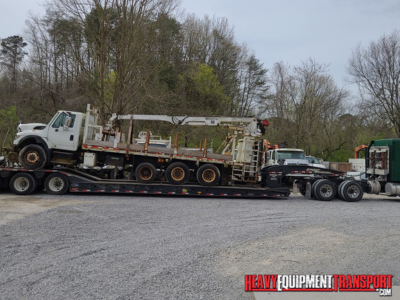 Grapple truck transport