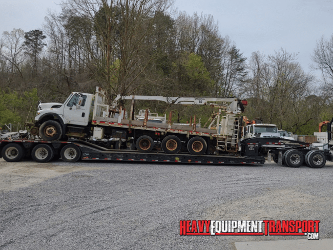 truck on trailer for transport