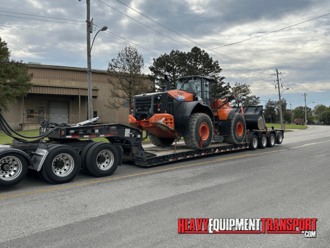 tractor on trailer for transport