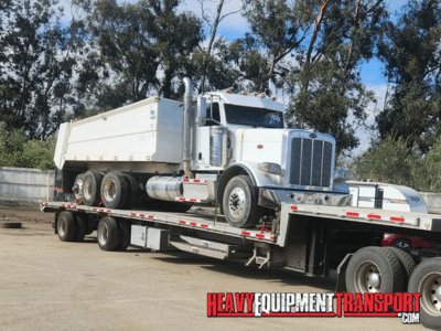 Hauling a 2020 Peterbilt 389 Day Cab on a stepdeck trailer