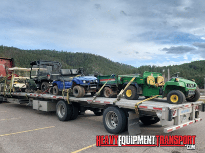Hauling Miscellaneous Golf Course Equipment on a step deck trailer