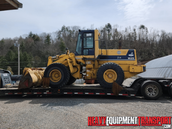 wheel loader on a lowboy for transport
