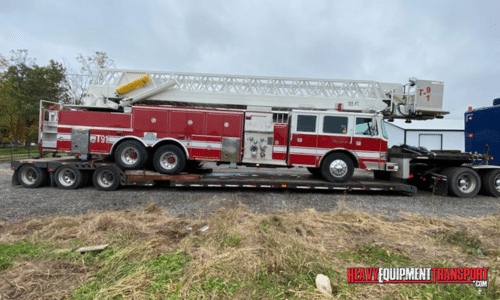 Shipping a Fire Truck on a lowboy trailer.