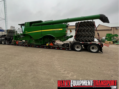 Transporting a 2014 John Deere S670 combine.