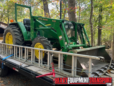 2005 John Deere 990 tractor transport.