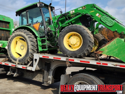 Shipping a 2013 John Deere 5100E tractor with front loader.