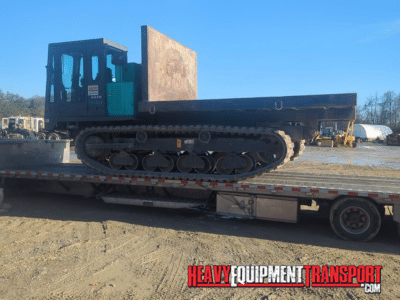 Morooka Trucks loaded for transport on a step deck trailer